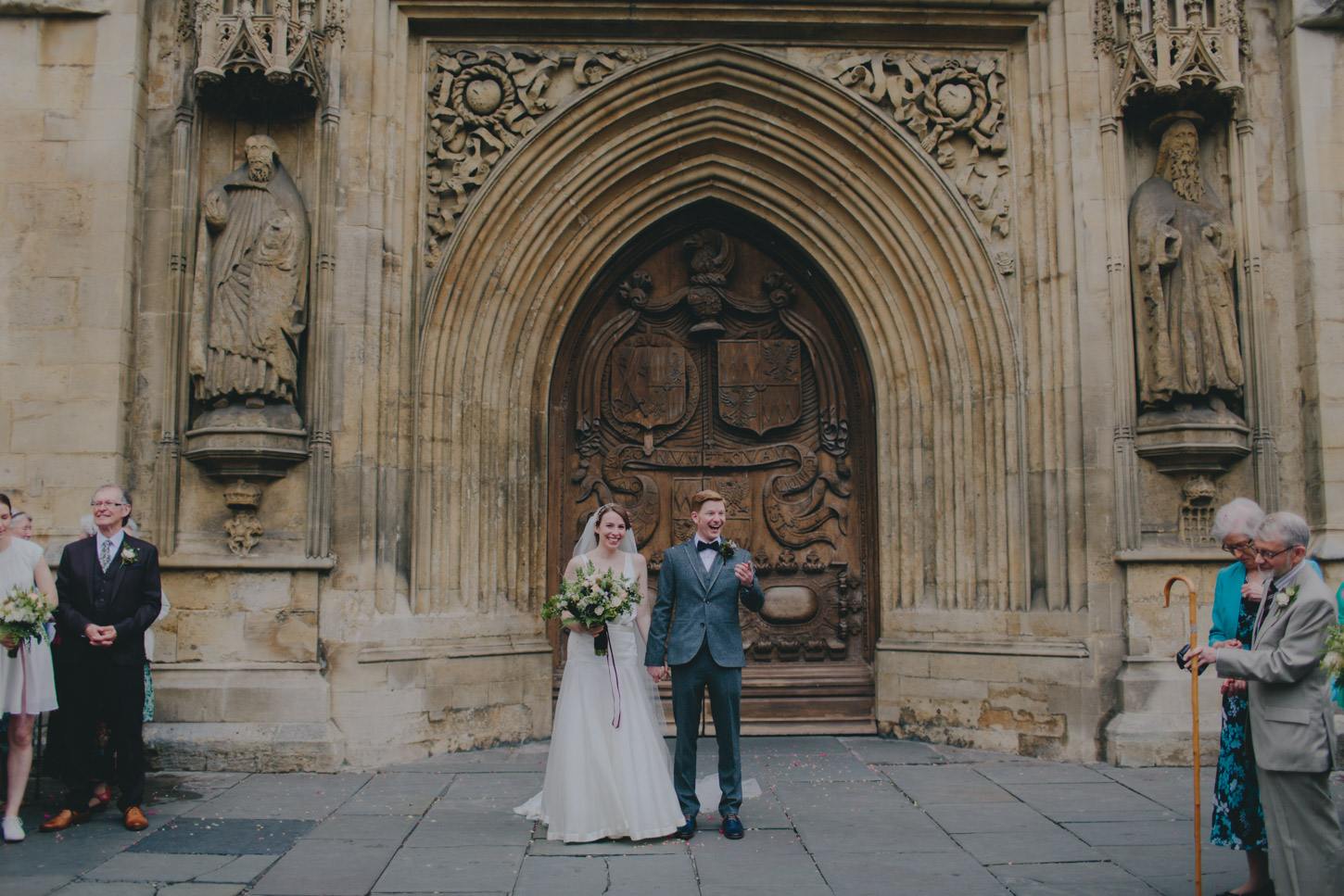 Bride and Groom at Bath Abbey by tori hancock photography
